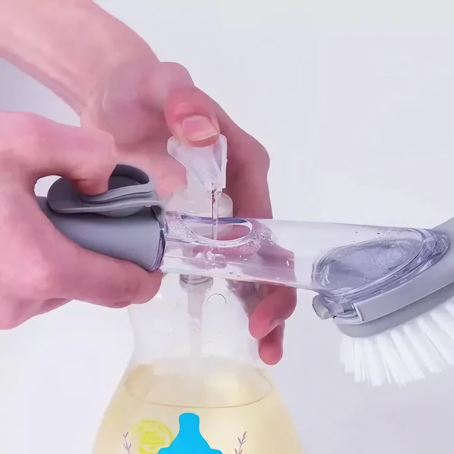 Cepillo lavaplatos con dispensador de jabón 2 en 1